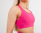Women's crossover sports bra in Pink