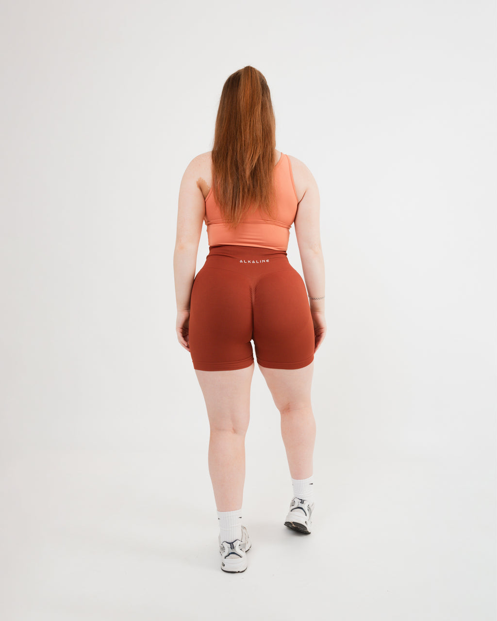Women's seamless scrunched shorts in Burnt Orange