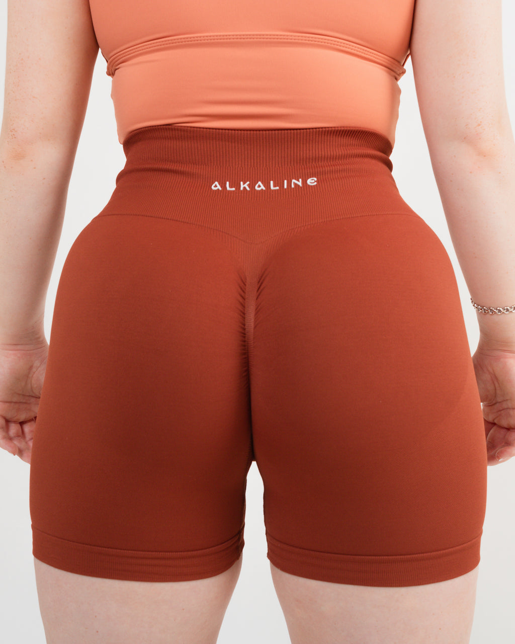 Women's seamless scrunched shorts in Burnt Orange