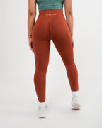 Women's seamless scrunched Leggings in Burnt Orange