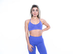 Women's adjustable crossover sports bra in Purple
